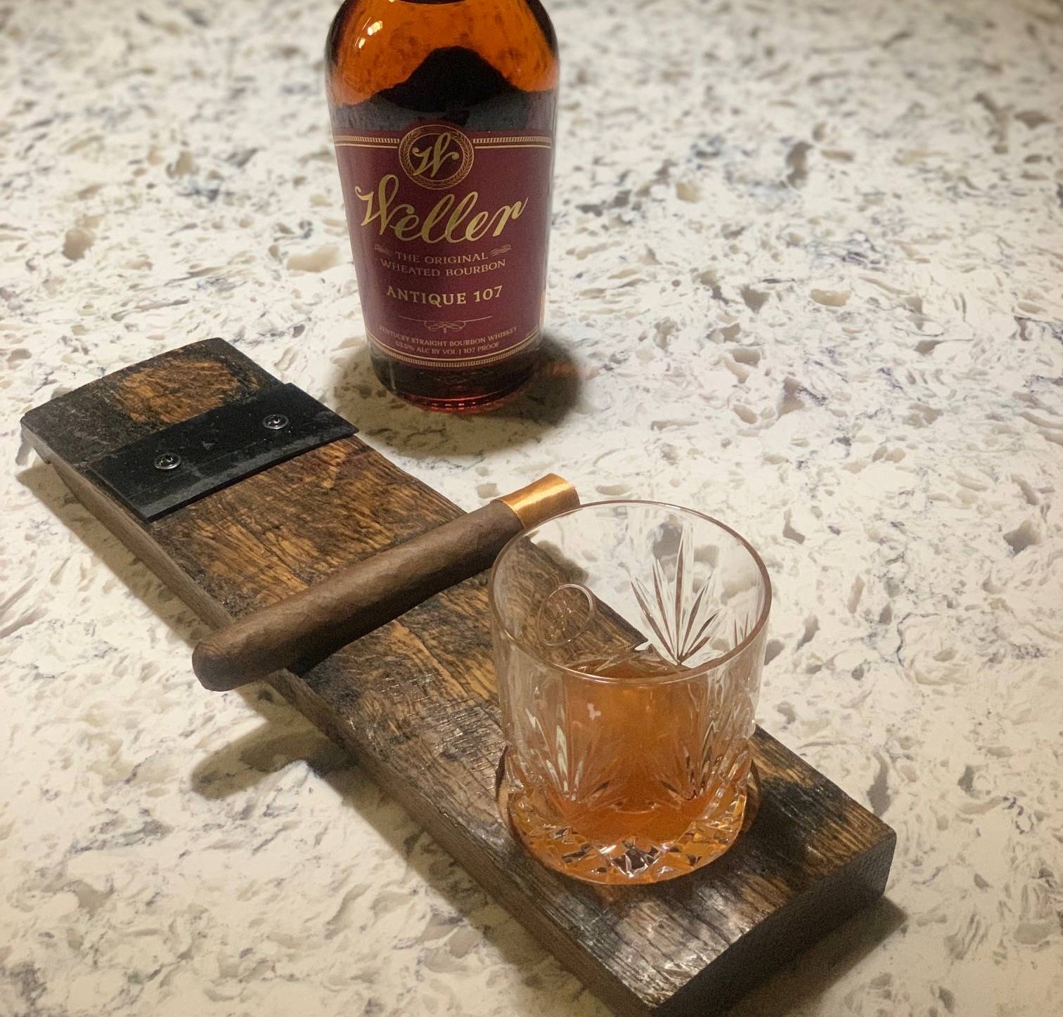 board with bottle and 2 glasses